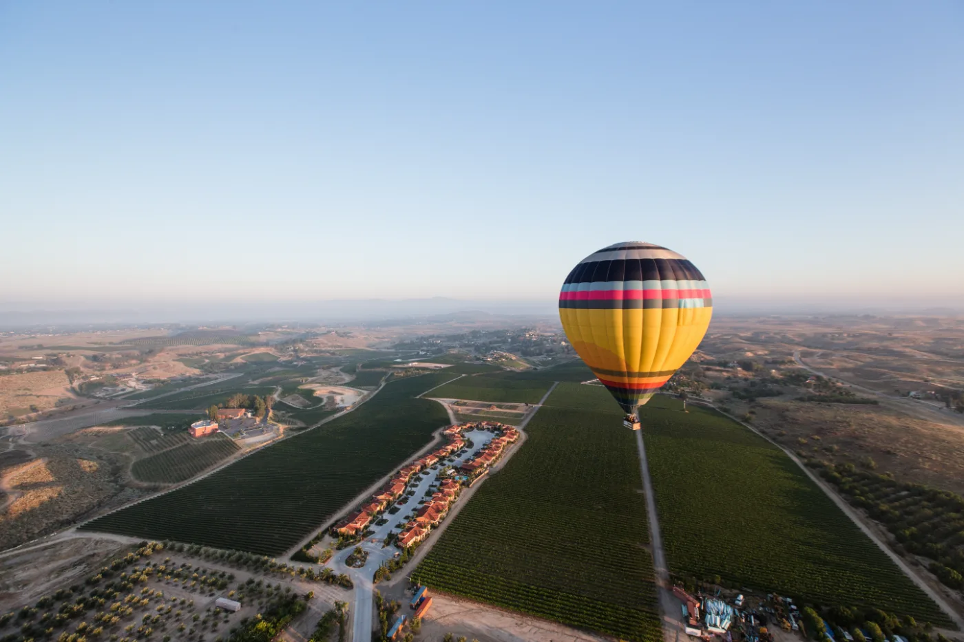 California Dreamin' hot air balloon drifting over the Temecula vineyards