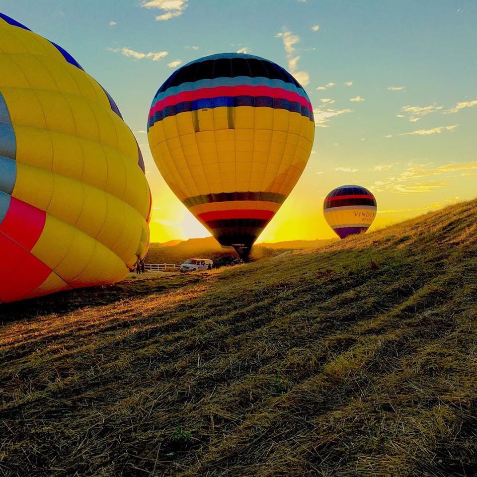 Sunrise hot air balloon flight over Temecula wine country